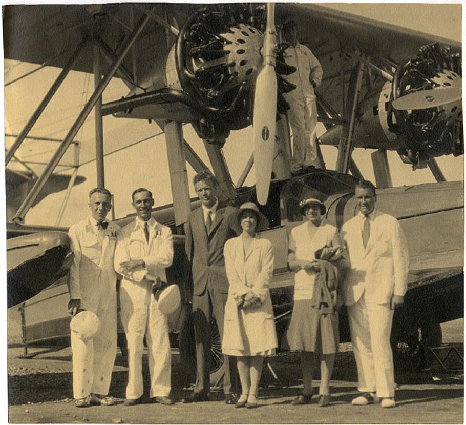 Photo of Charles and Anne Lindbergh with Betty and Juan Trippe and Pan American Airways personnel by a PAA S-38 amphibian.