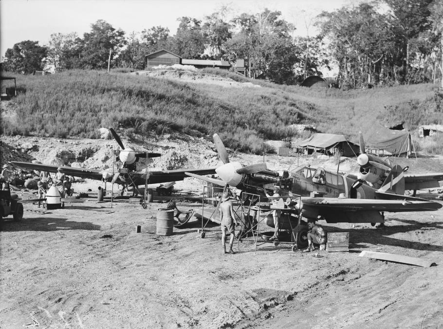 Ground crew servicing a group of Curtiss P-40 Kittyhawks