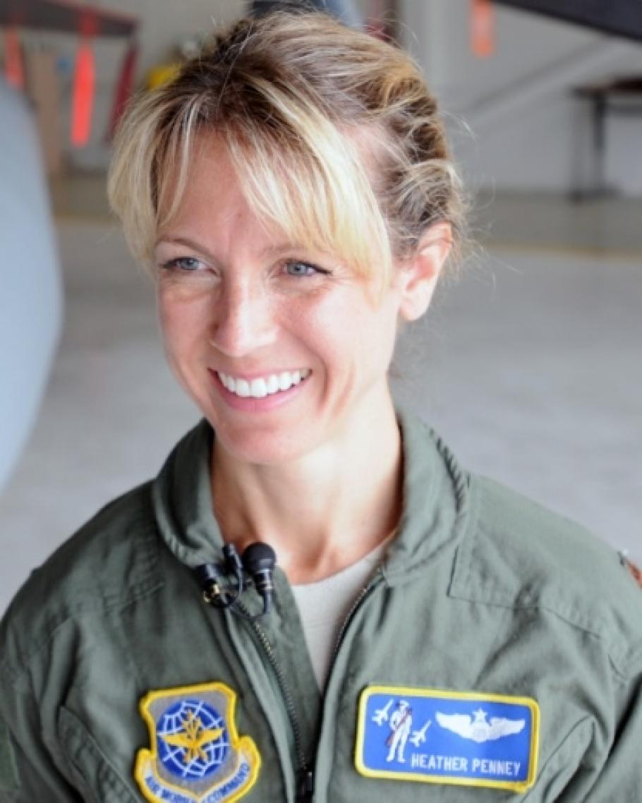 Pilot&nbsp;Heather Penney, wearing a flight suit. 