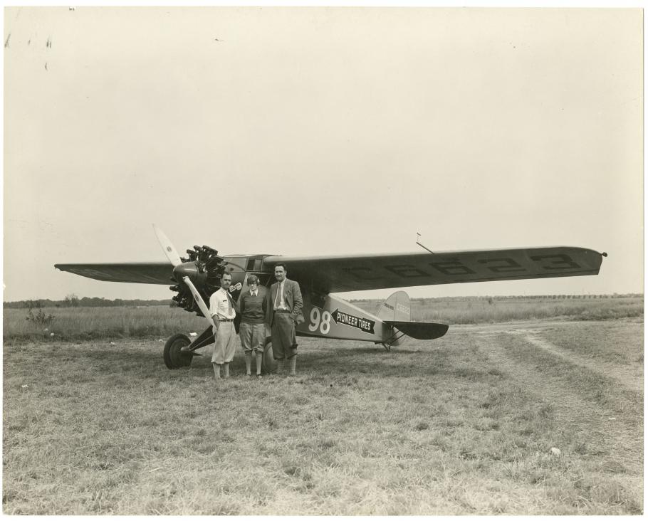 Pilot Francis D. "Chief" Bowhan (left) with Mary Grace and her husband F. J. Grace