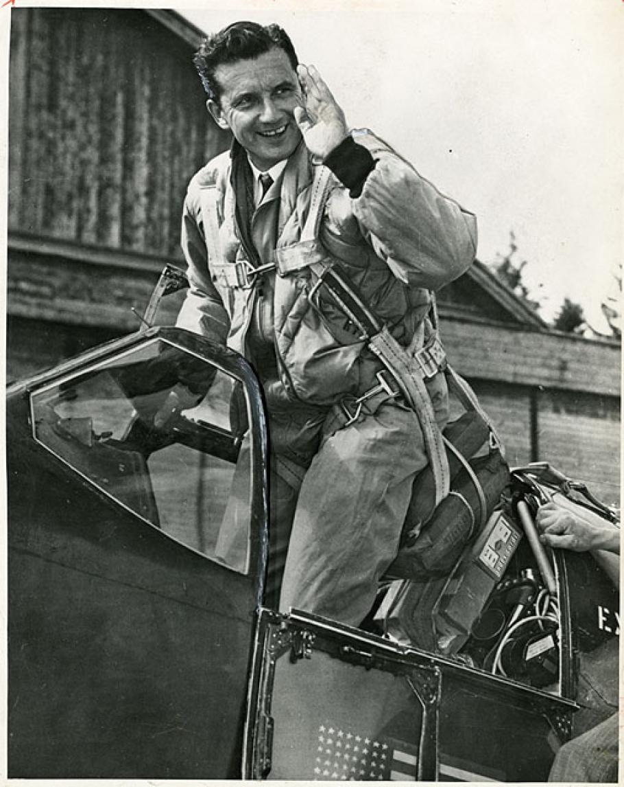 Image of Charles Blair posing in the cockpit of Excalibur III
