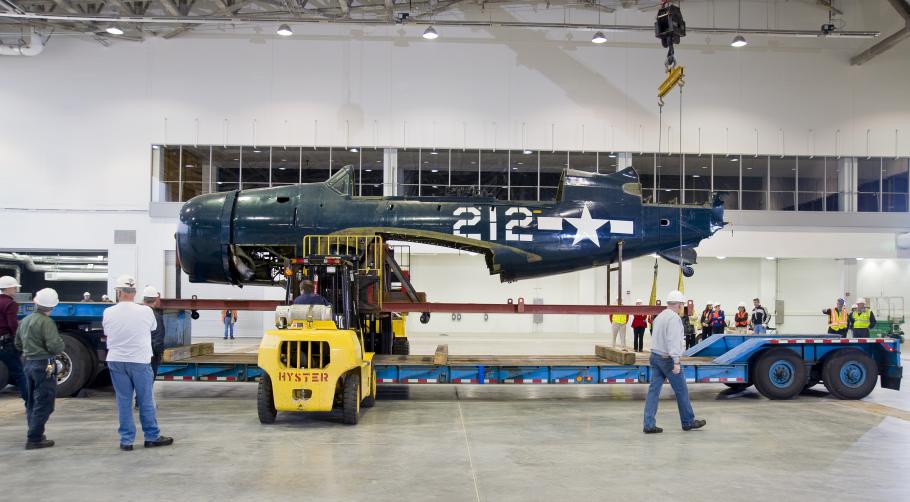 Staff Move <i>Helldiver</i> into Mary Baker Engen Restoration Hangar
