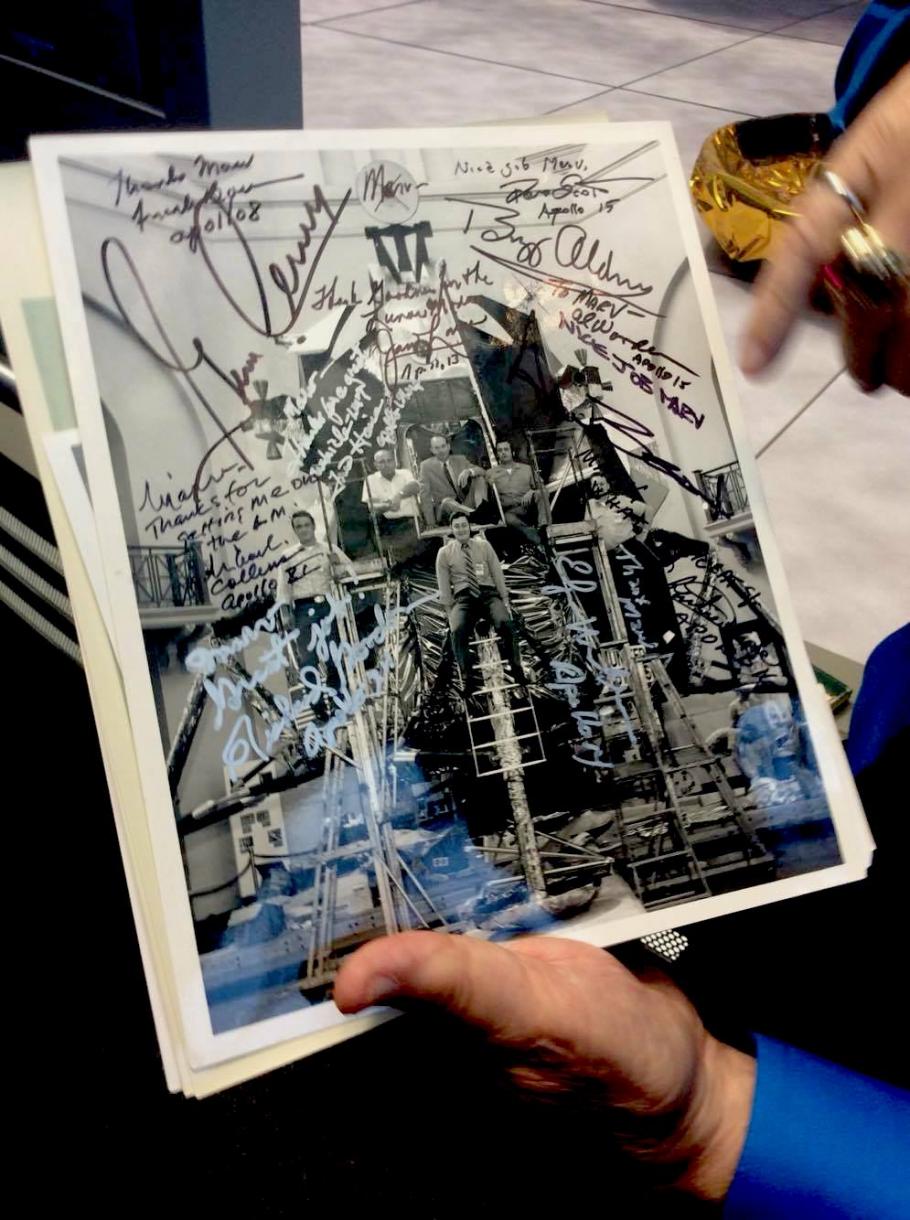 Close up of signed photographer in Marv&#039;s hands. 