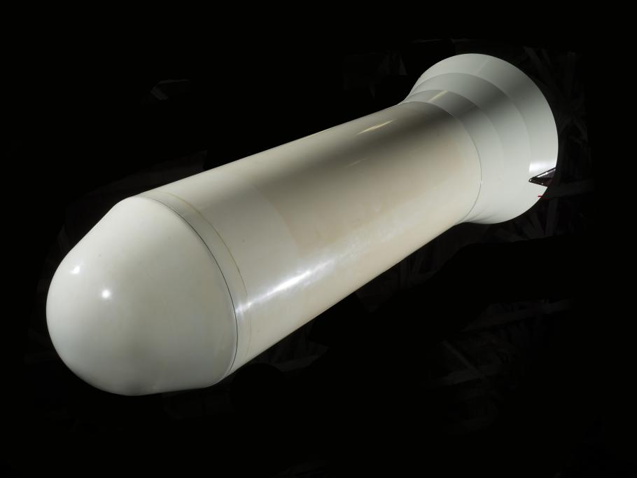 White metal missle with rounded top