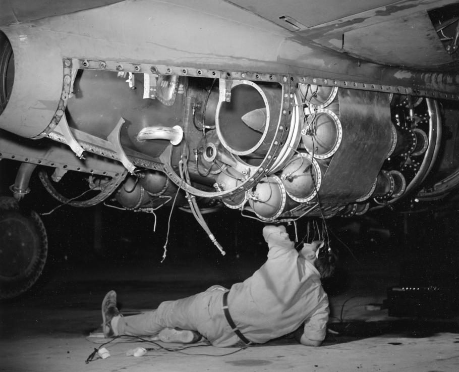 Technician Working on a Centrifugal Flow Engine