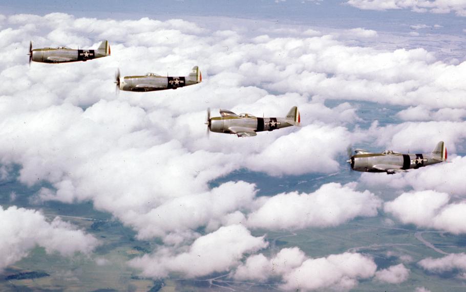 A flight of Mexican 201 Squadron P-47 Thunderbolts over Luzon