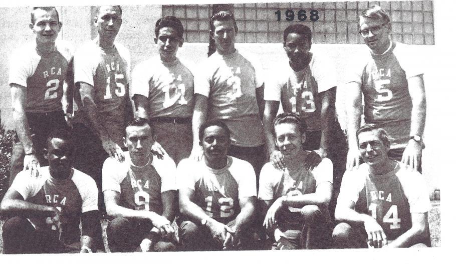 posed photo of men in sotfball uniforms