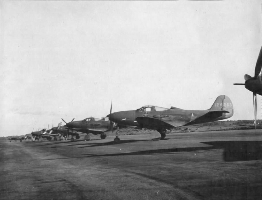 Bell P-39 Airacobras passing through Wideawake Field