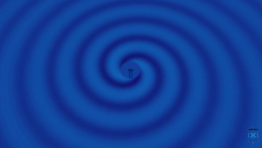 A mathematical animation showing the gravitational waves produced as two black holes spiral toward each other and then collide.
