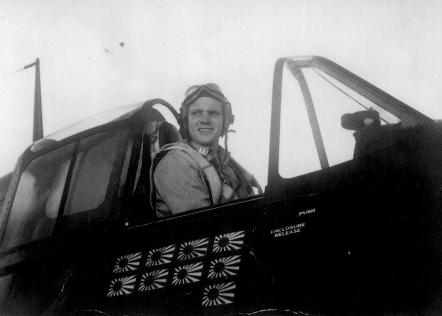 Man in cockpit of aircraft