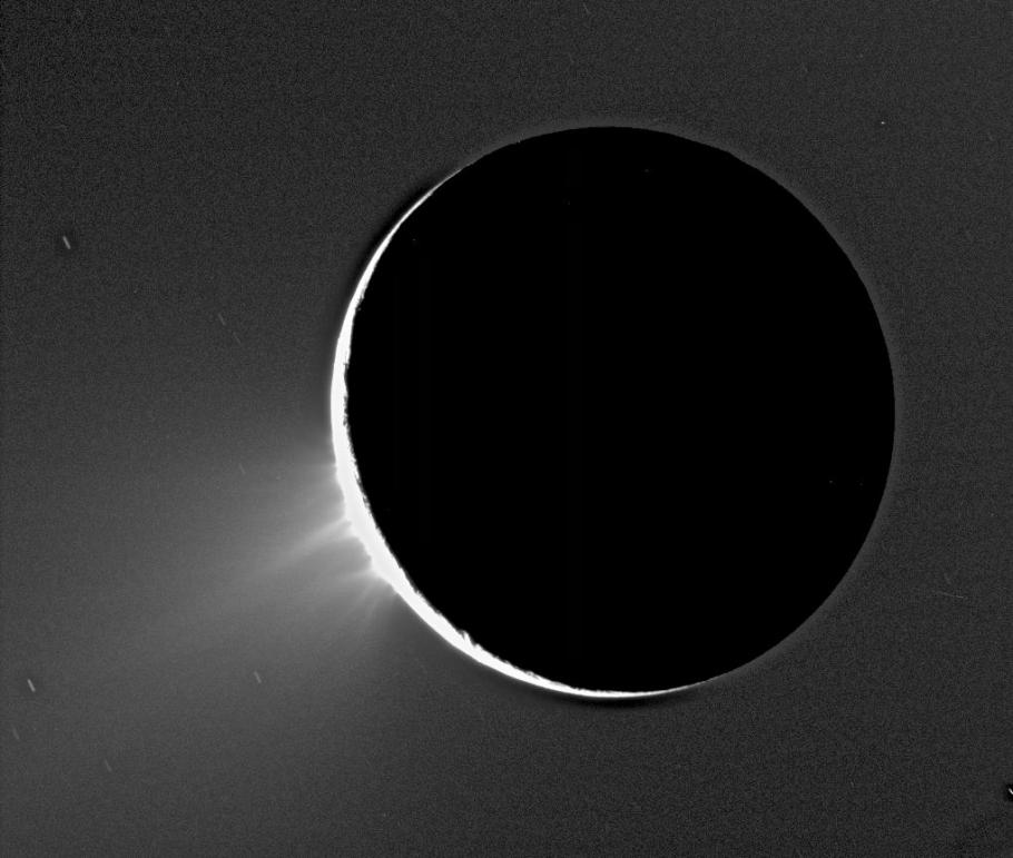 A view of the water plumes erupting from the south polar region of Enceladus. 