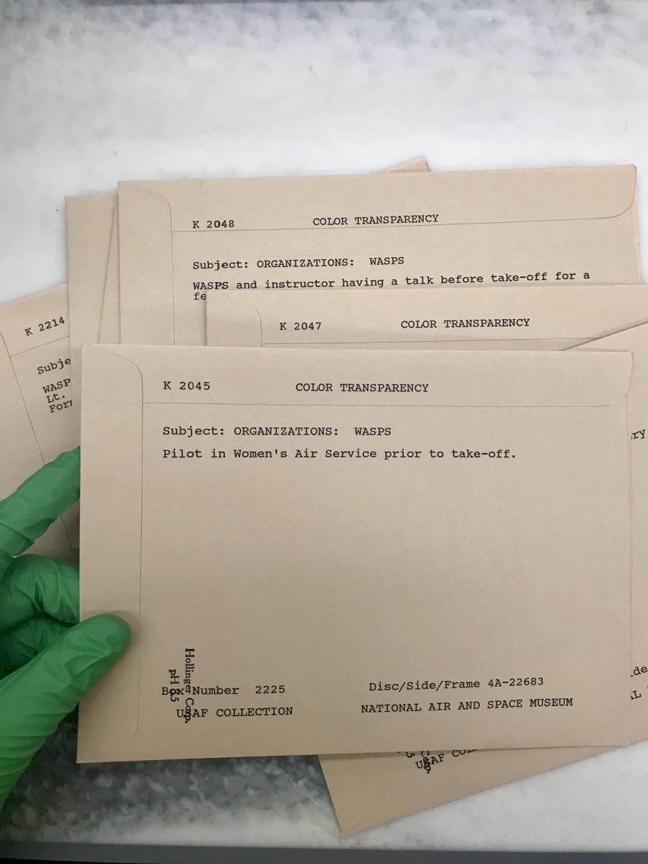 WASP Images in Archival Storage. Each transparency contains a sleeve with identifying information and accompanying caption.