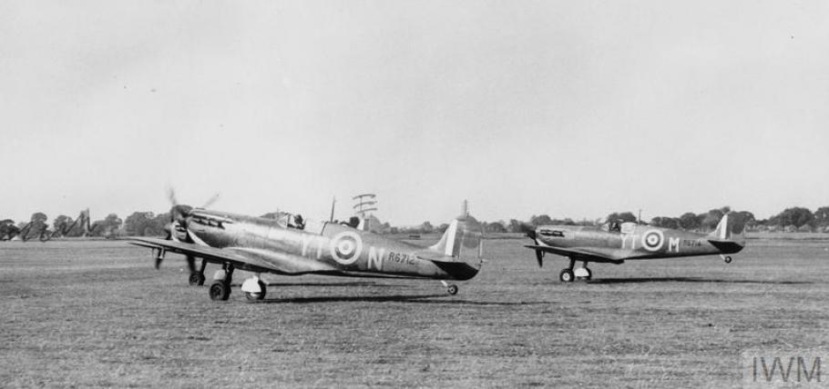 Two spitfires taking off