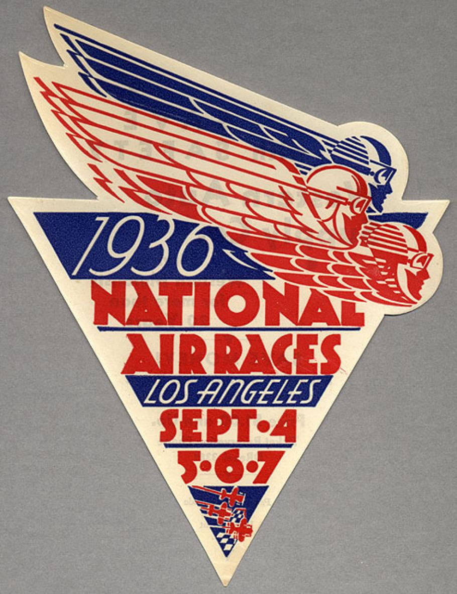 Small sticker in red and blue. Shaped like a triangle and includes the text 1936 National Air Races Los Angles Sept. 4, 5, 6, and 7. 