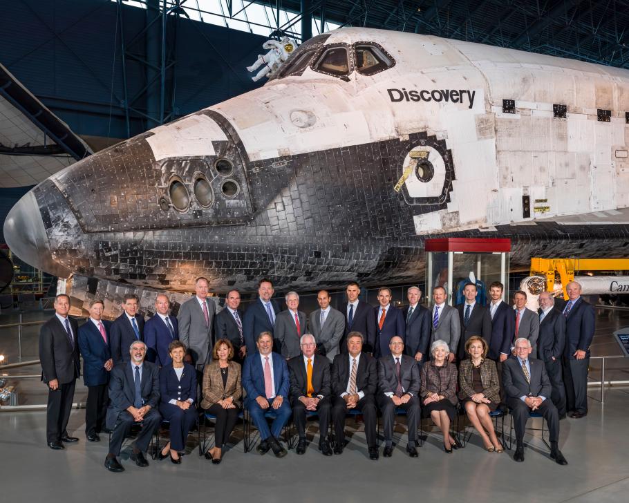 Group photo in front of Space Shuttle Discovery. 