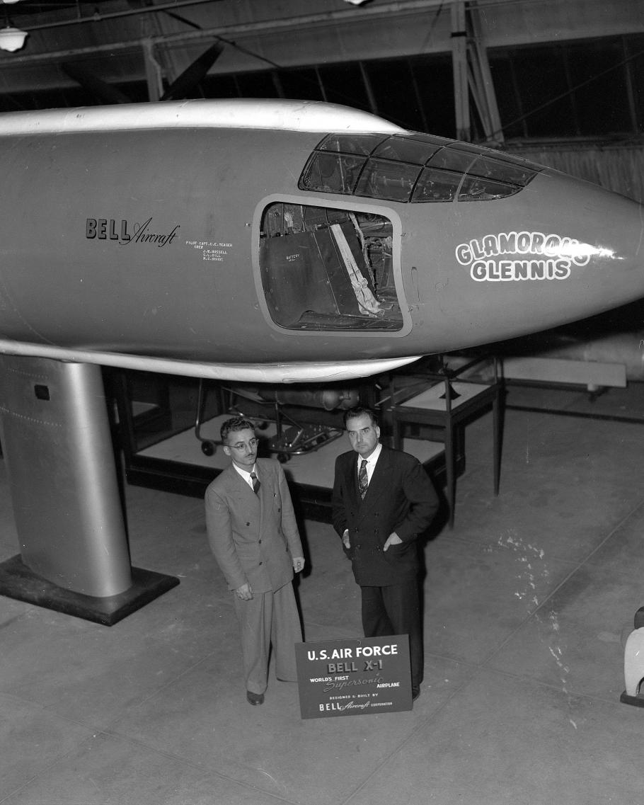 Two men in front of aircraft