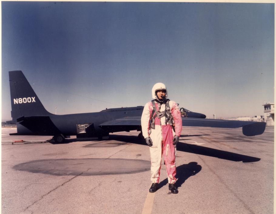 Man in red and white overals in front of U-2