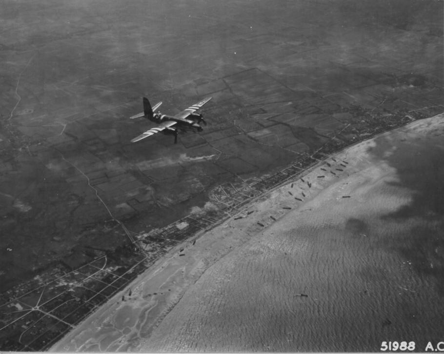 Flying medium bomber with invasion stripes