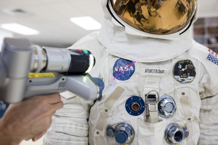 laser arm with spacesuit