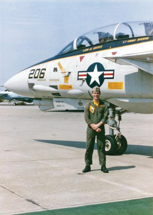 Chris Browne as a young man in uniform standing in front of his plane.