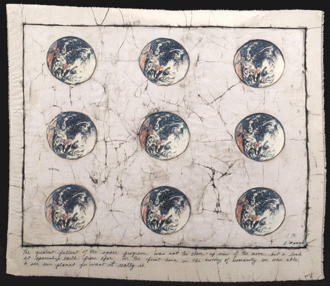 Nine images of the Earth as a whole circle against a light background. At the bottom is a quotation reading “The greatest fallout of the space program was not a close–up view of the moon, but a look at spaceship Earth from afar. For the first time in the history of humanity, we were able to see our planet for what it really is.”