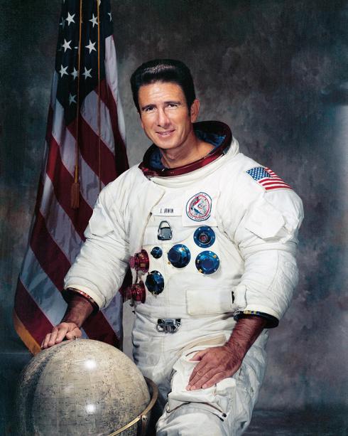 Portrait of Apollo 15 astronaut James Irwin in spacesuit.