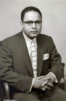 Charles C. Diggs, Jr., an African-American Congressman, poses formally.