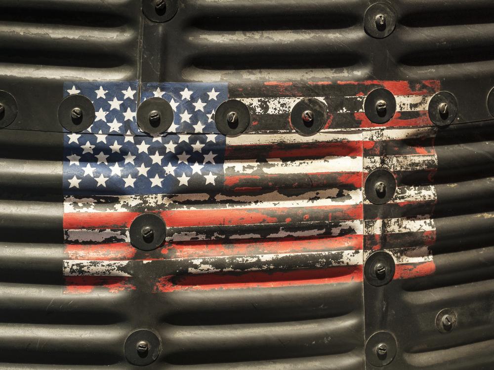 Close up of the American flag on the Gemini 4 capsule. 