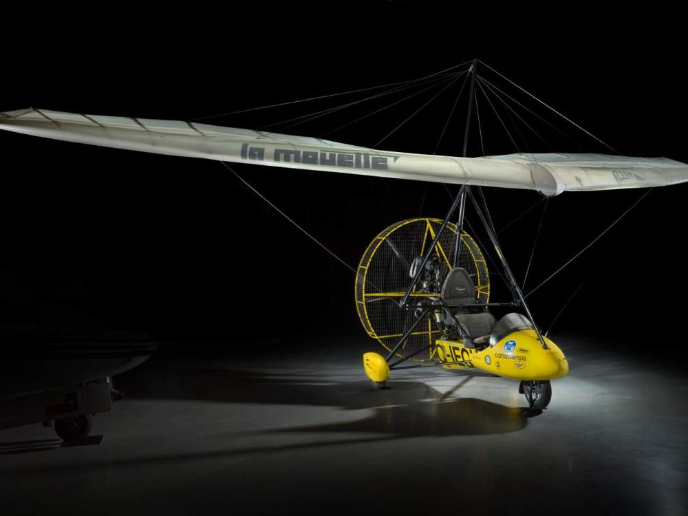  Yellow painted French two-seat flying wing ultralight inside the museum. 