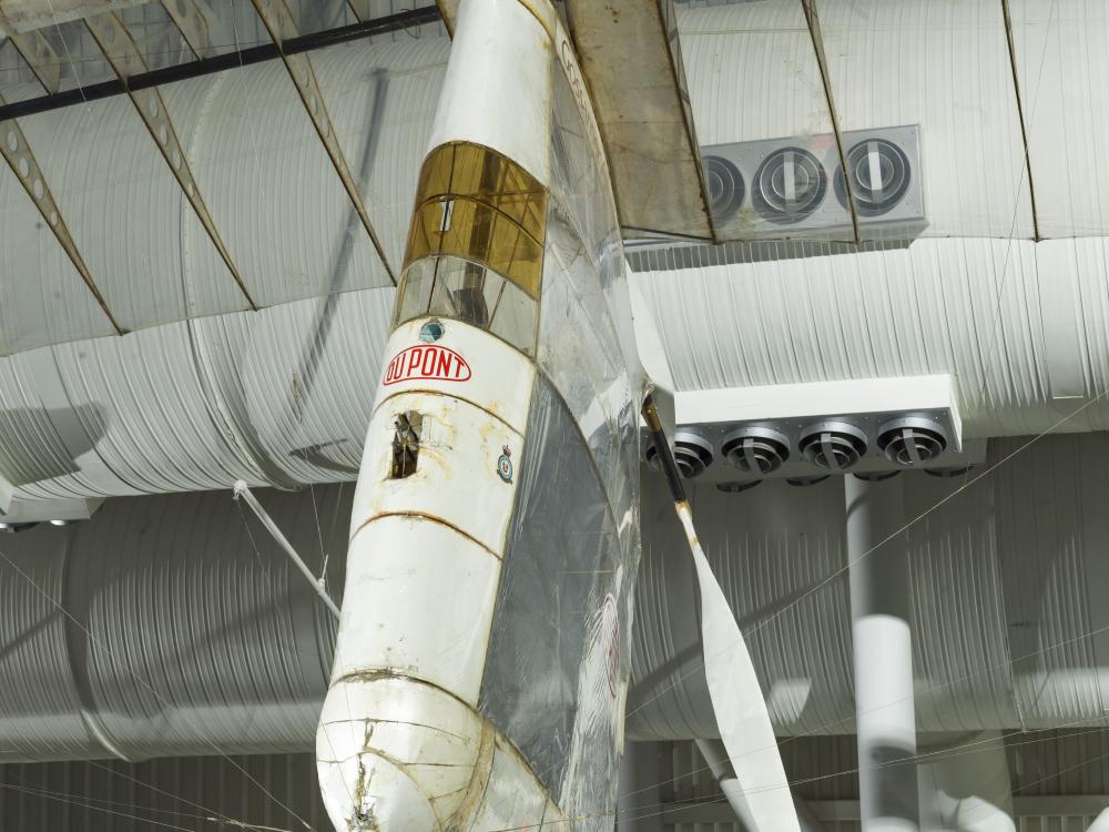 Image of an aircraft hanging in a gallery 