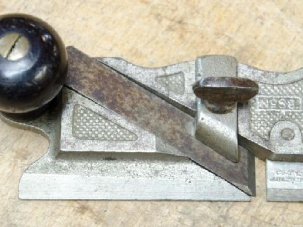 A close-up of a Stanley Model 98 Side Rabbet Plane tool, circa 1910.