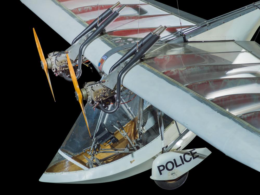 View of cockpit of a twin engine ultralight aircraft. The background of the image is black.