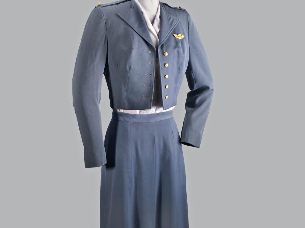 A photograph of a blue-gray uniform on a mannequin. 