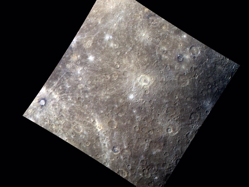 An image of Mercury's surface featuring difference shades of browns and grays.