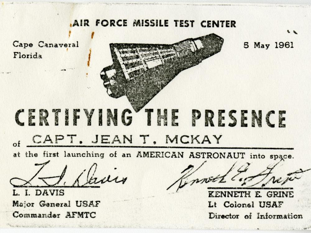 Card with an image of a Mercury capsule stating that it is certifying the present of Capt. Jean T. McKay, with signatures at the bottom.