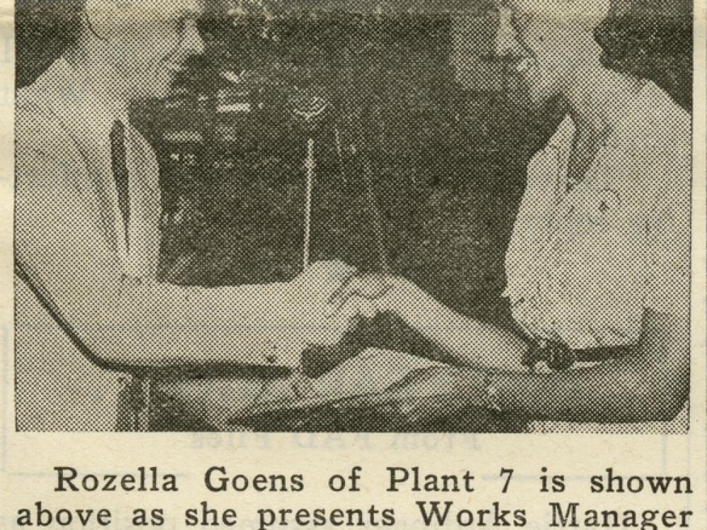 A man shakes hands with a woman