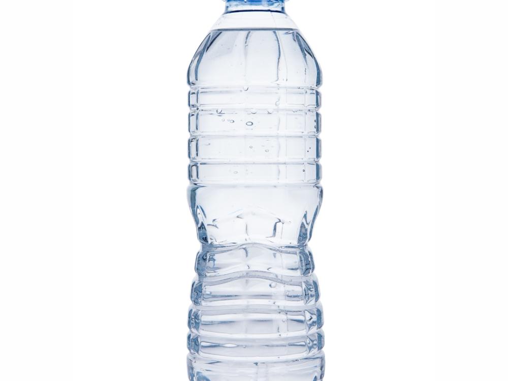 A disposable water bottle with water in it. 