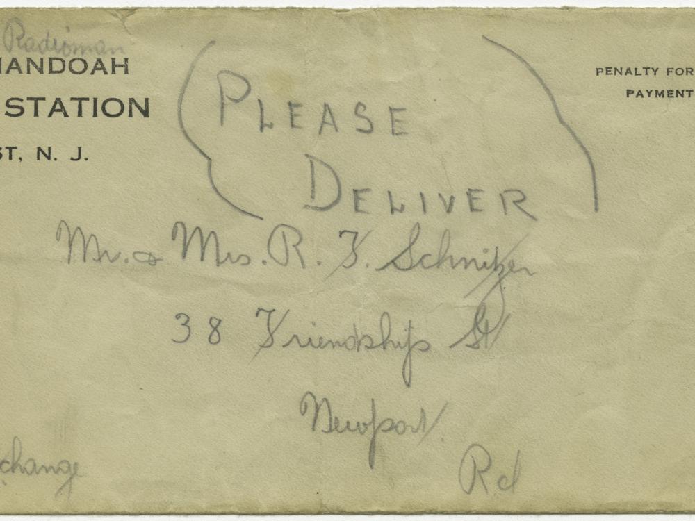 The front of an addressed weathered enveloped with the words please deliver written on the front in big letters.