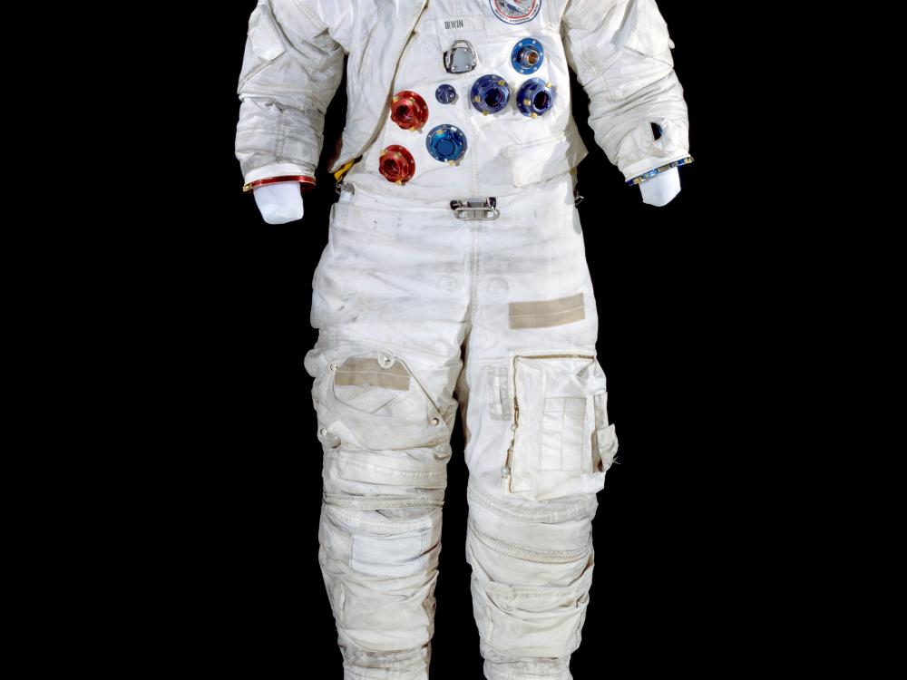 White spacesuit with blue and red ports on the front of it.