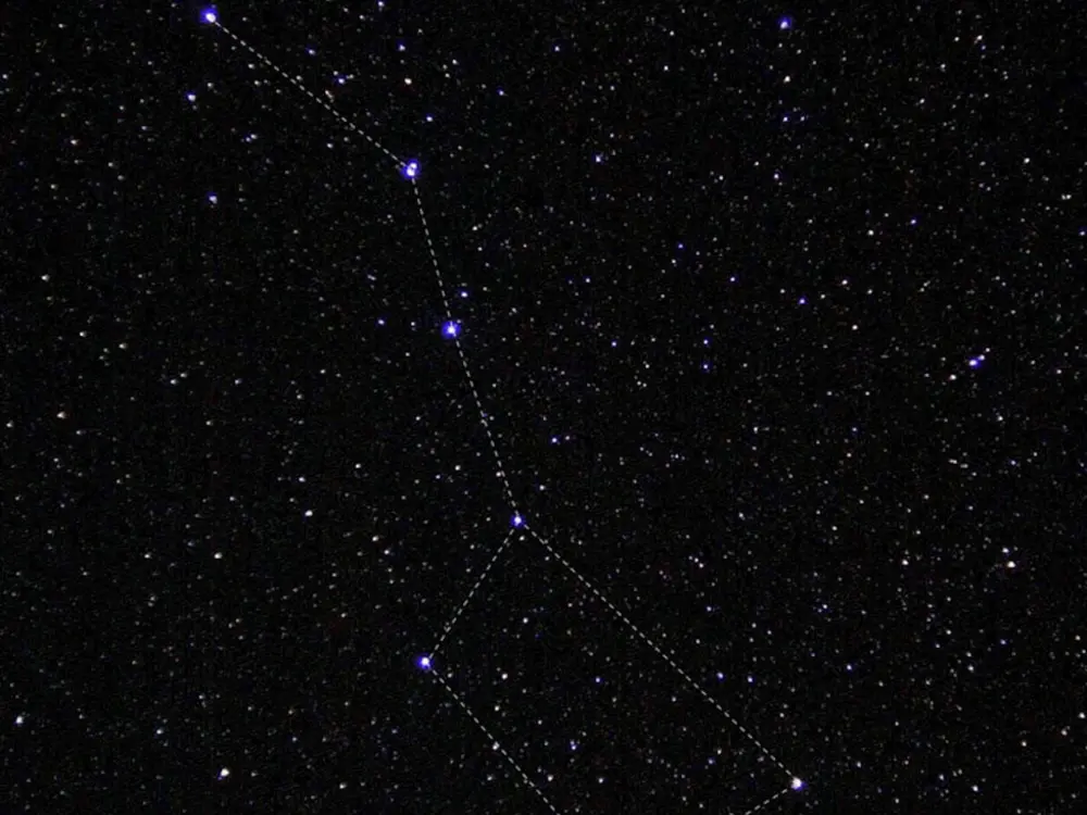A picture of the night's sky with the outline of the constellation the Big Dipper super imposed. 