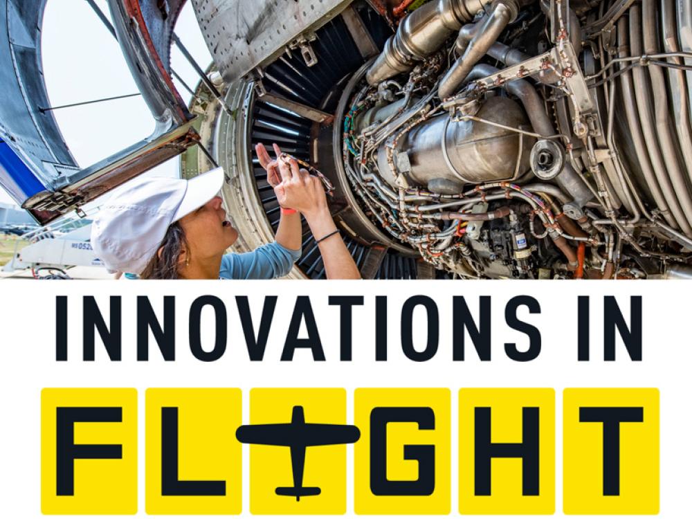 A woman stands close to an airplane engine taking a photo. Overtop the image is text that reads "Innovations in Flight."