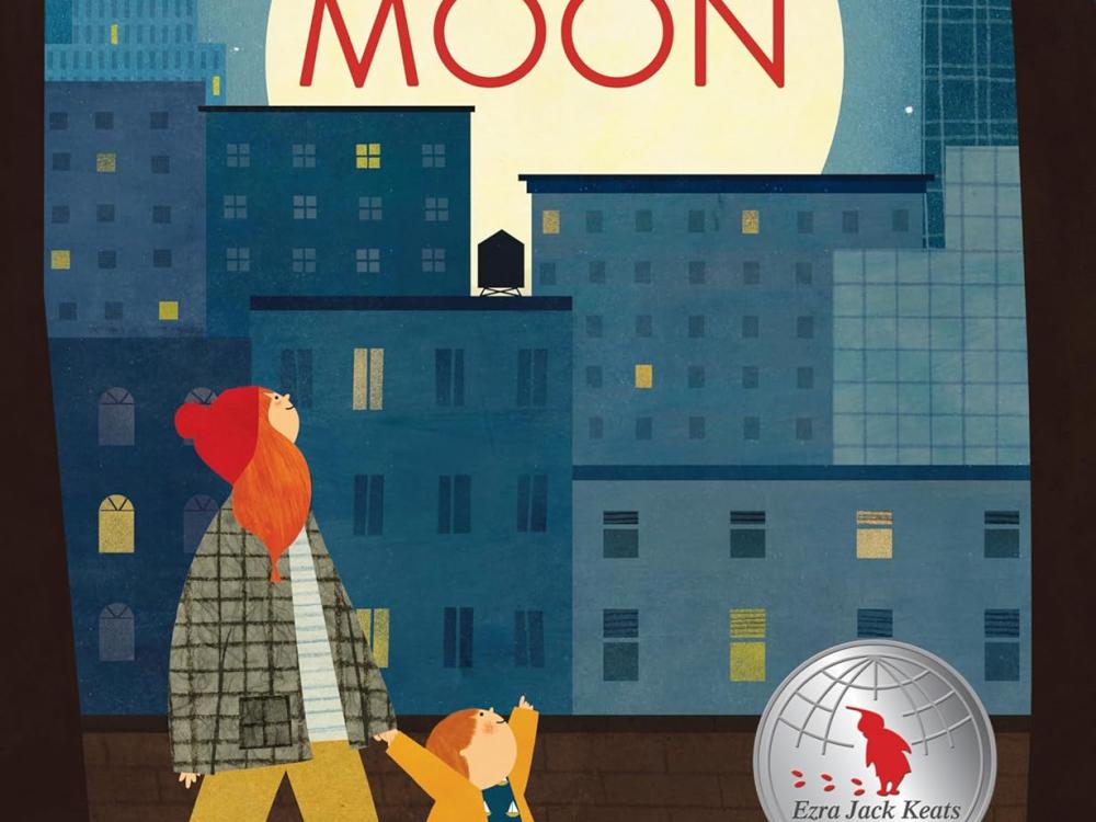 The image is a book cover illustration depicting a cityscape at night with a woman and child on a walk. A large, full moon occupies the upper center of the cover, illuminating the sky behind it. Below the moon, stylized dark blue and grey buildings form an urban skyline. 