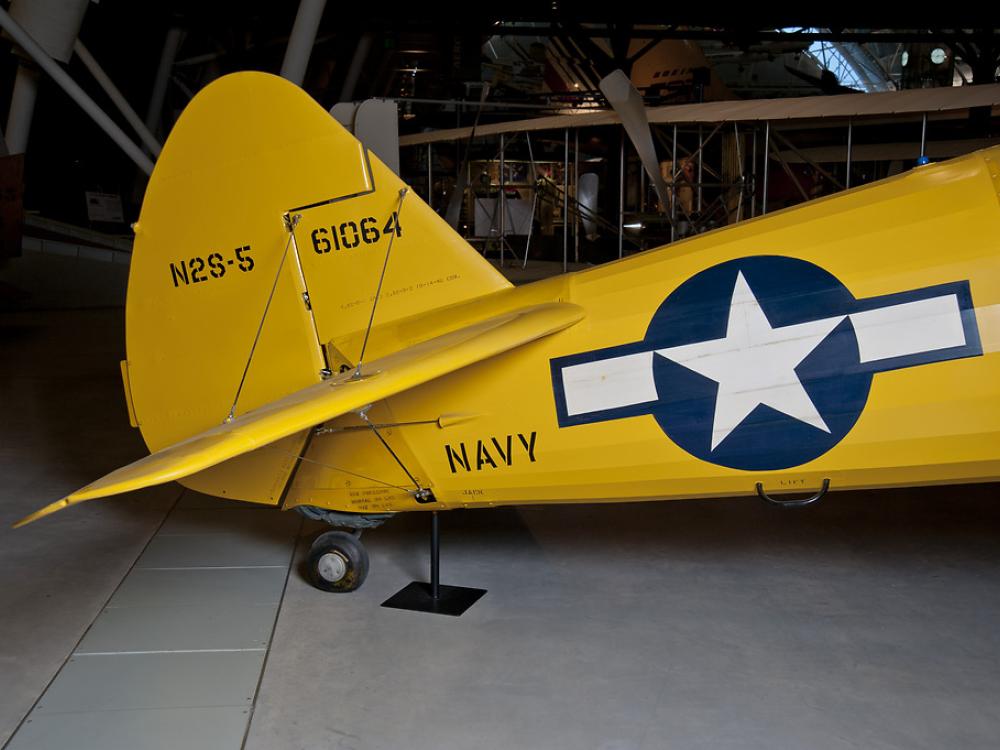 Yellow painted vertical stabilizer of an aircraft. 