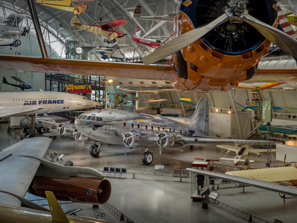 Silver painted commercial airplane displayed at the museum. 