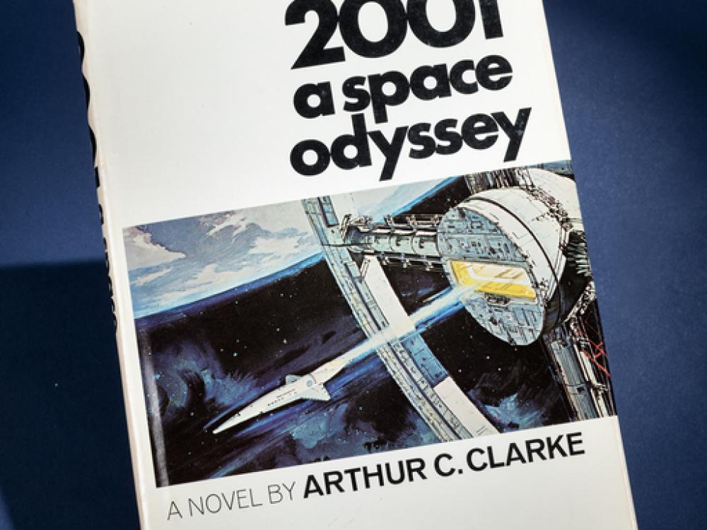 A book titled 2001 A Space Odyssey with a spacecraft on the cover.