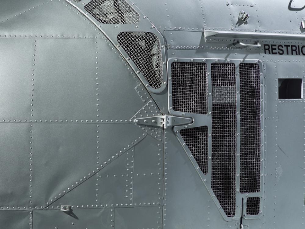 View of the cockpit and a valve of a helicopter. 