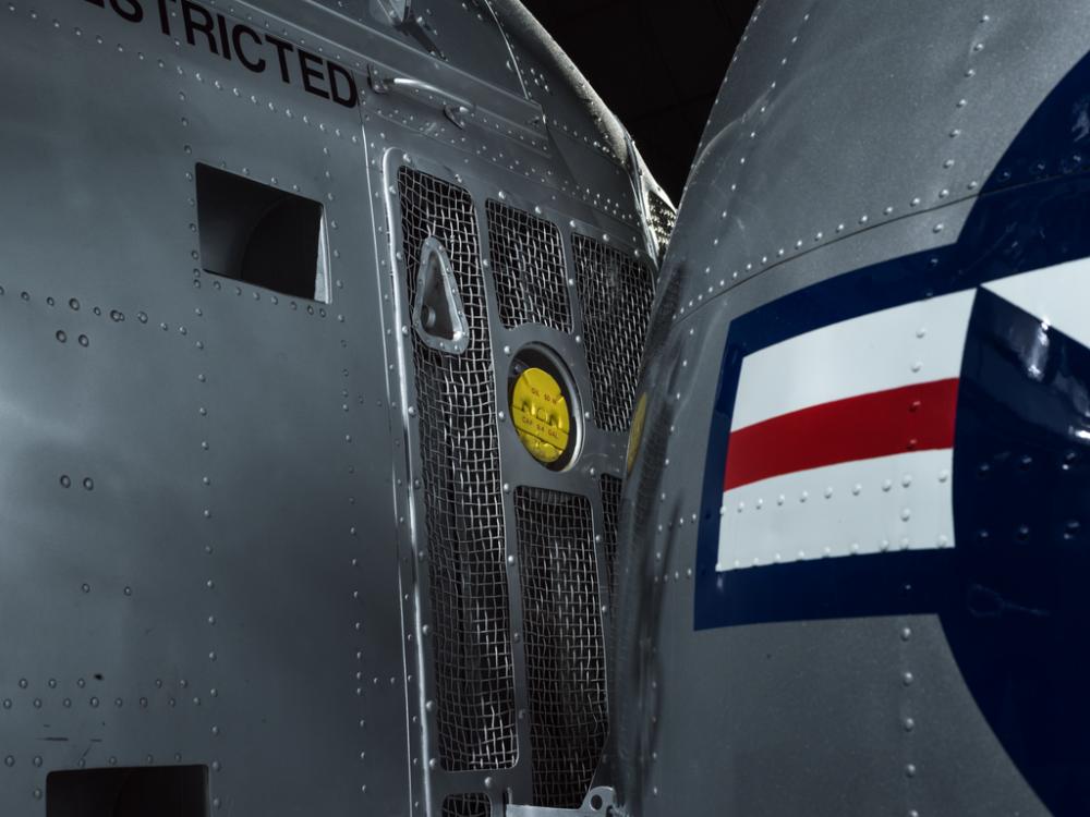 Close of view of an oil cap on an helicopter. 