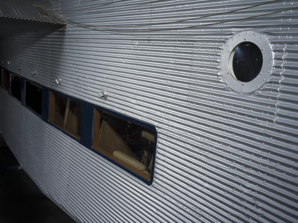 View looking into a passenger cabin of a plane.