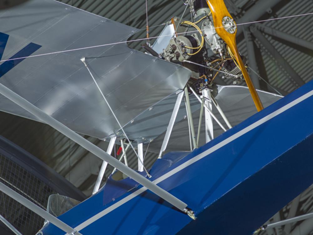 Close up view of an engine and propellers. 