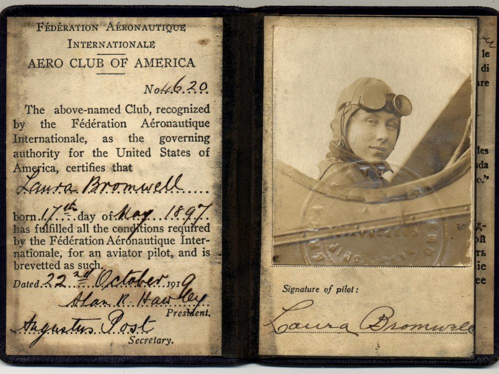 Old vintage aviator&#039;s license with a woman&#039;s face.